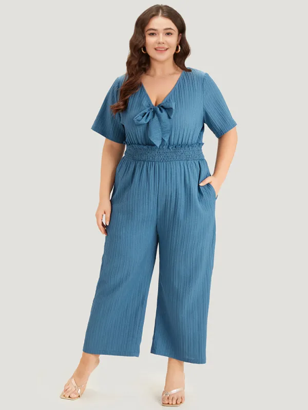 Textured Bowknot V Neck Shirred Pocket Jumpsuit sold by Bloomchic