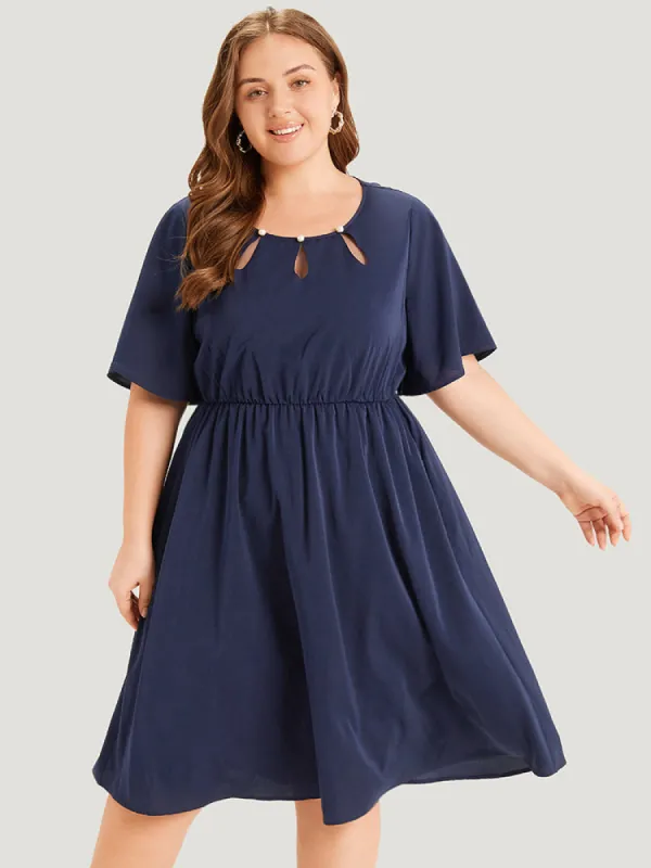 Solid Cut Out Pocket Pearl Beaded Detail Dress sold by Bloomchic