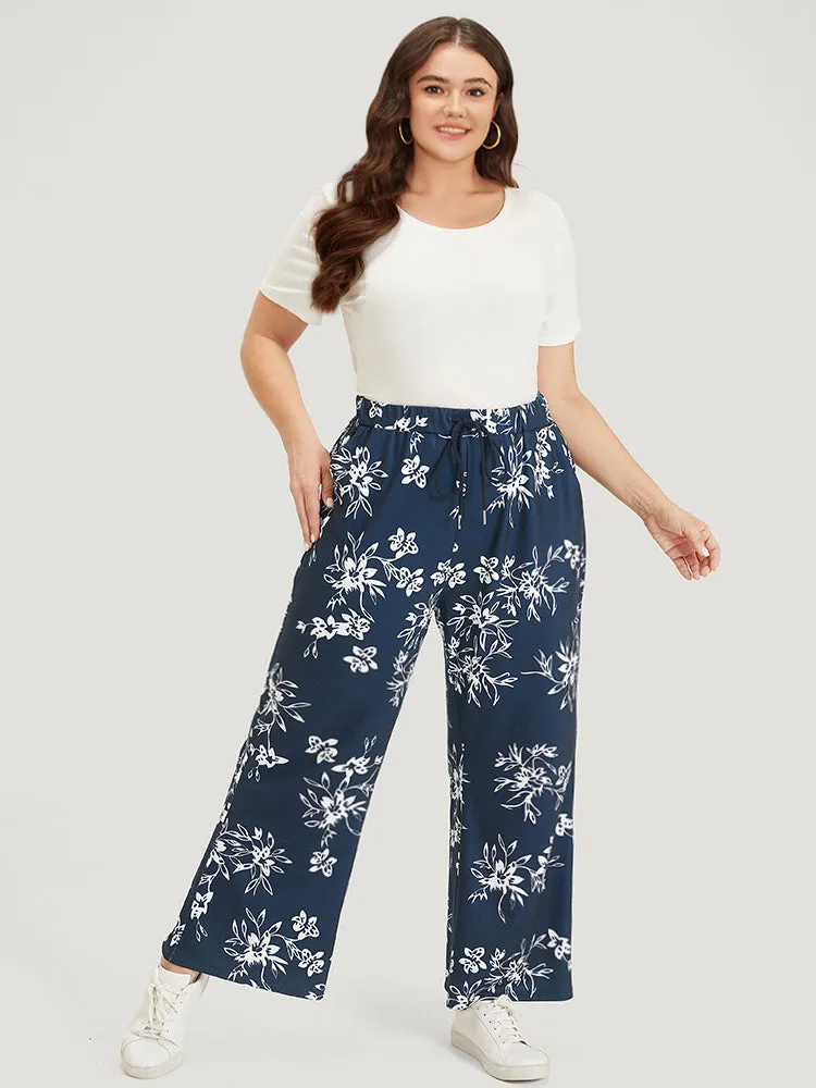 Silhouette Floral Print Drawstring Pocket Sweatpants sold by Bloomchic