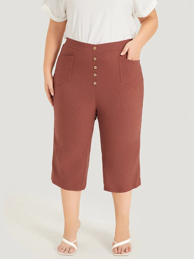 Plain Button Detail Pocket Cropped Pants sold by Bloomchic