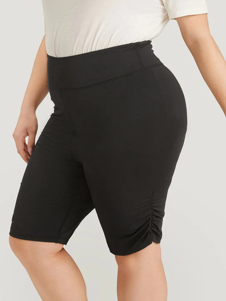 Solid Ruched Wideband Waist At The Knees Leggings sold by Bloomchic