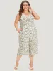 Ditsy Floral Ruffle Trim Pocket Wrap Cami Jumpsuit sold by Bloomchic