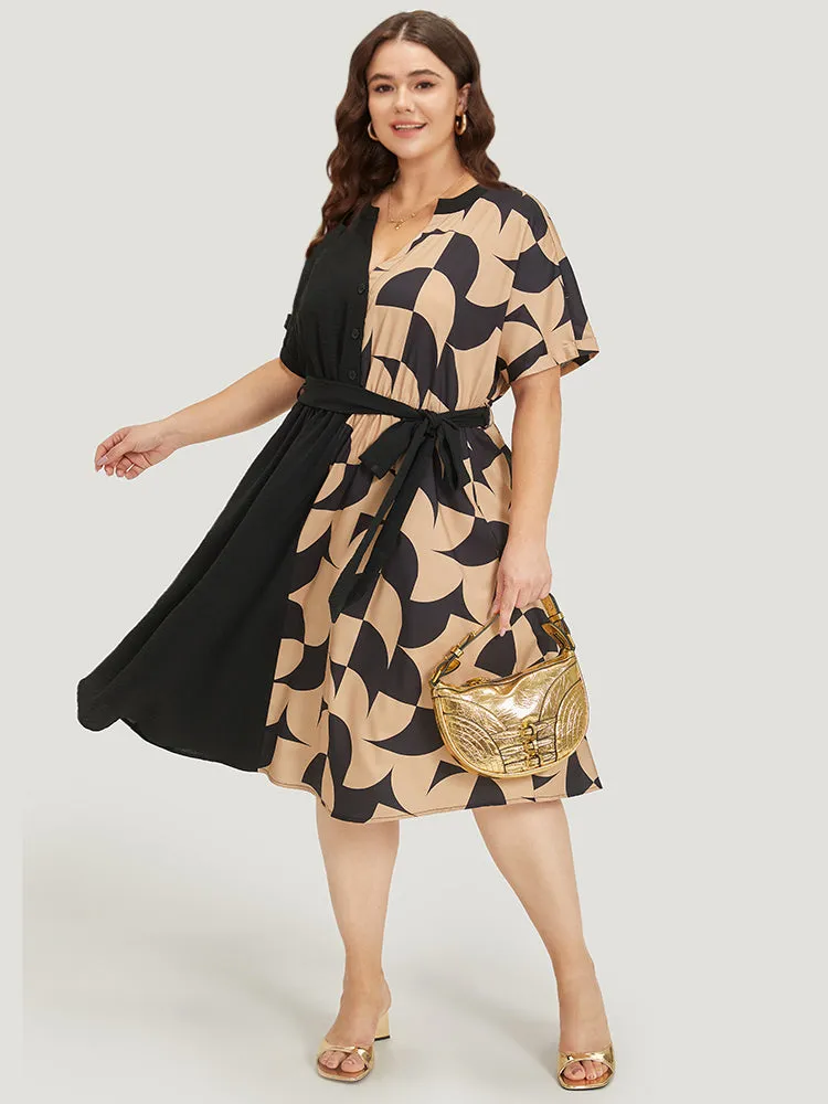 Geometric Patchwork Pocket Belted Notched Dress sold by Bloomchic