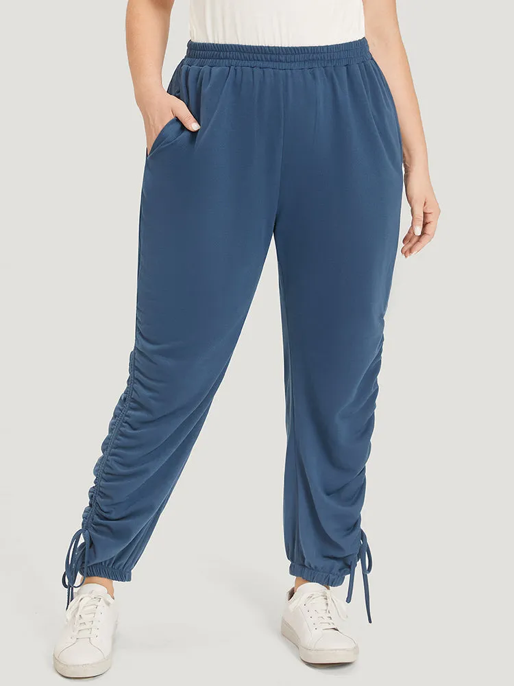 Solid Pocket Drawstring Hem Elastic Waist Sweatpants sold by Bloomchic