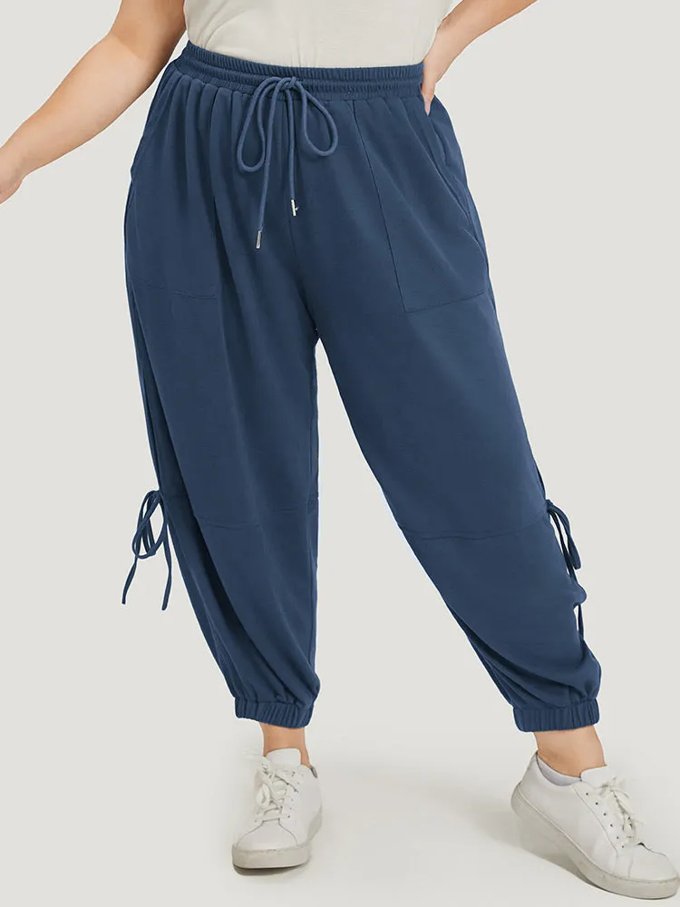 Solid Drawstring Pocket Ties Cut Out Sweatpants sold by Bloomchic