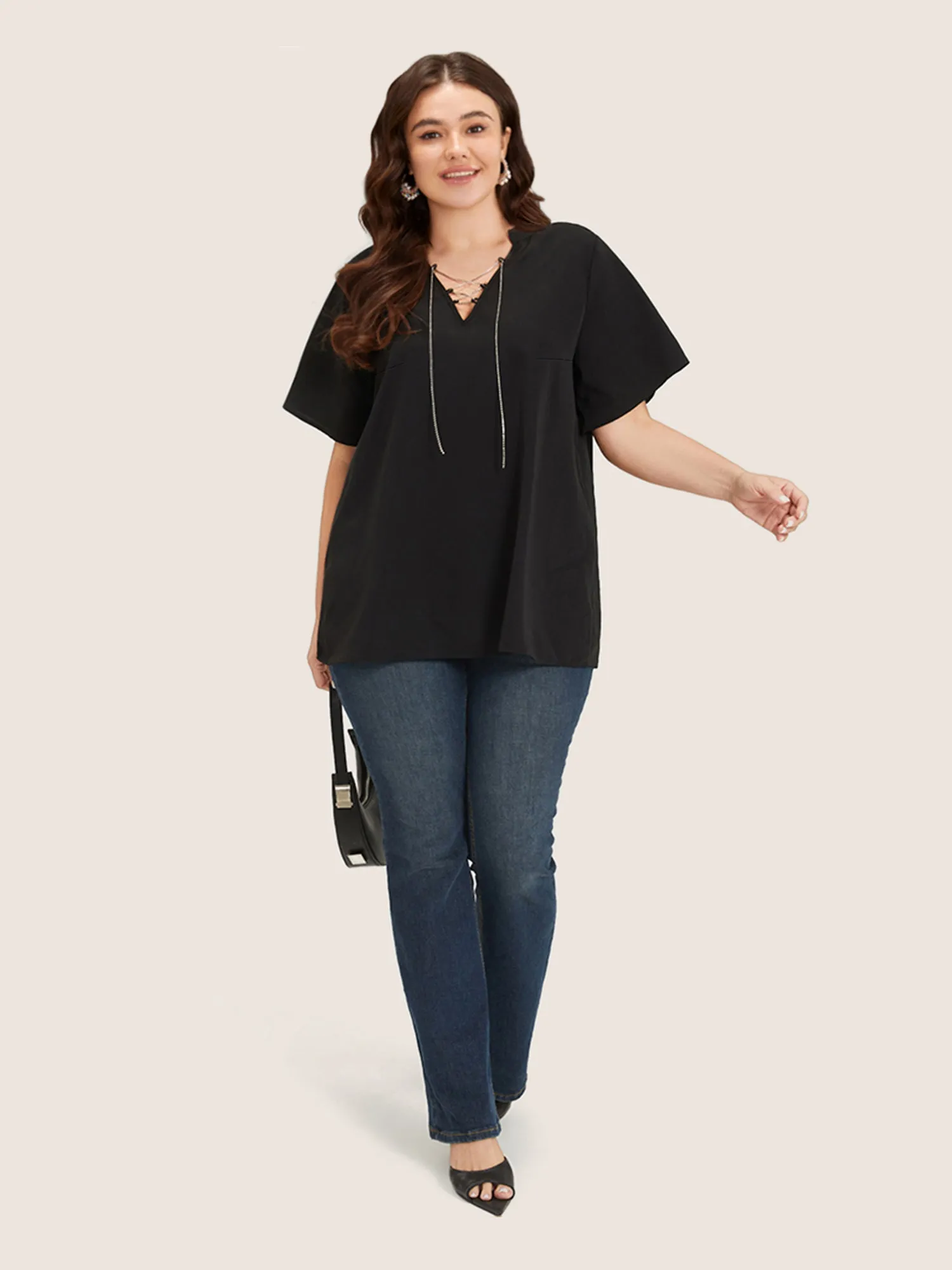 Solid Crisscross Notched Metal Decor Blouse sold by Bloomchic product image thumbnail 4