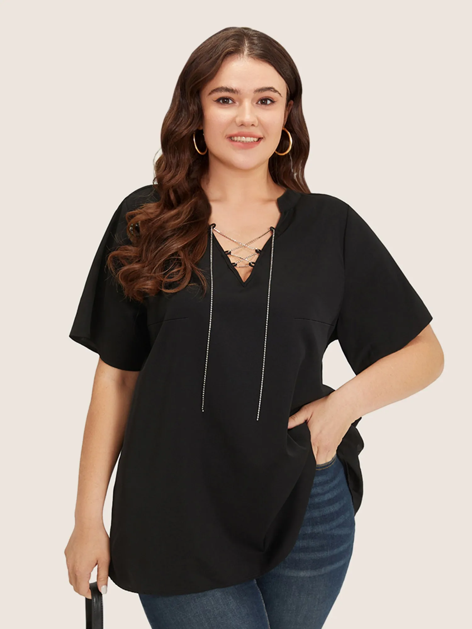 Solid Crisscross Notched Metal Decor Blouse sold by Bloomchic product image thumbnail 5
