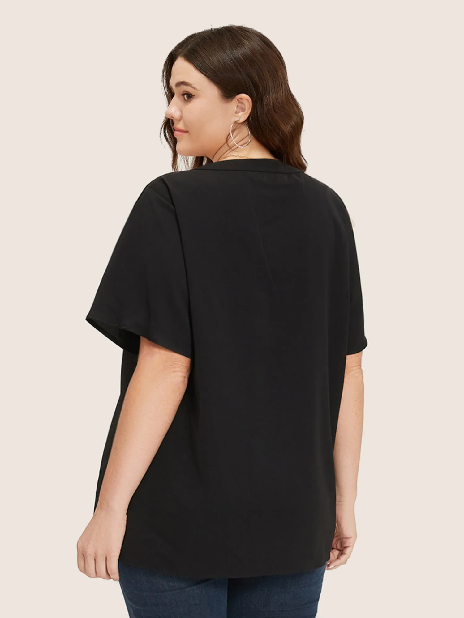 Solid Crisscross Notched Metal Decor Blouse sold by Bloomchic product image thumbnail 2