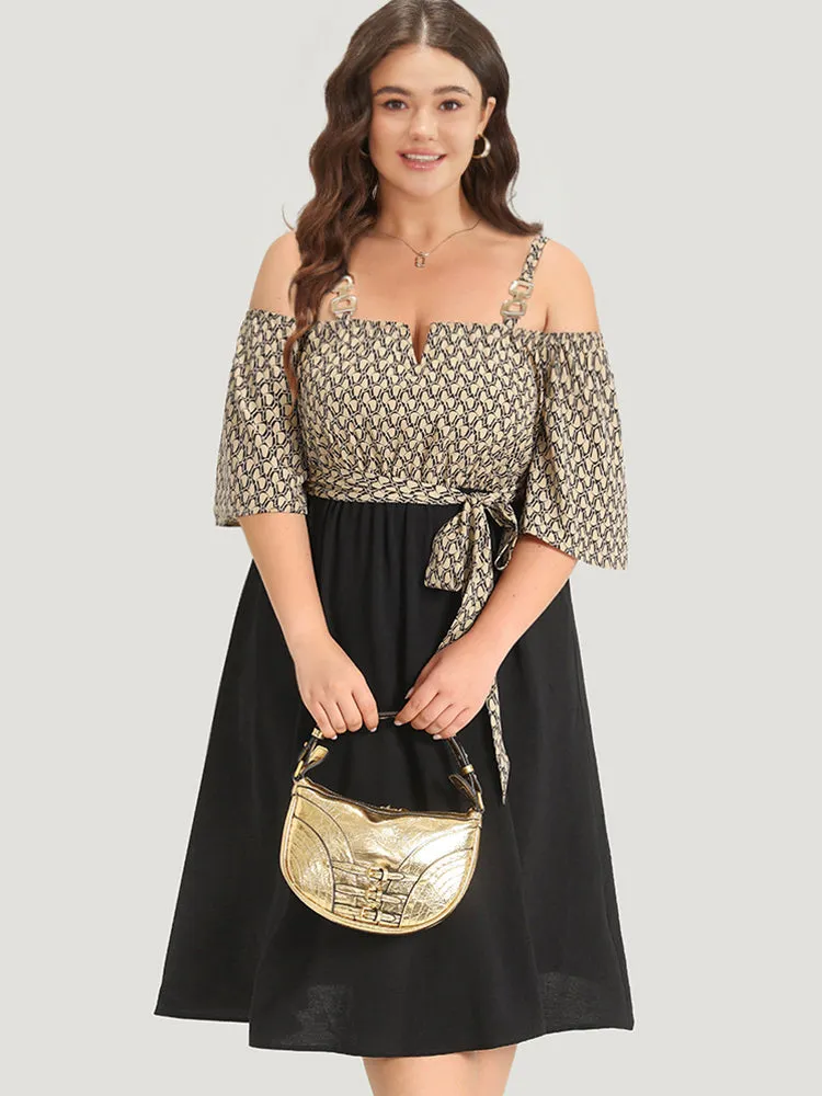 Geometric Patchwork Pocket Belted Cold Shoulder Dress sold by Bloomchic