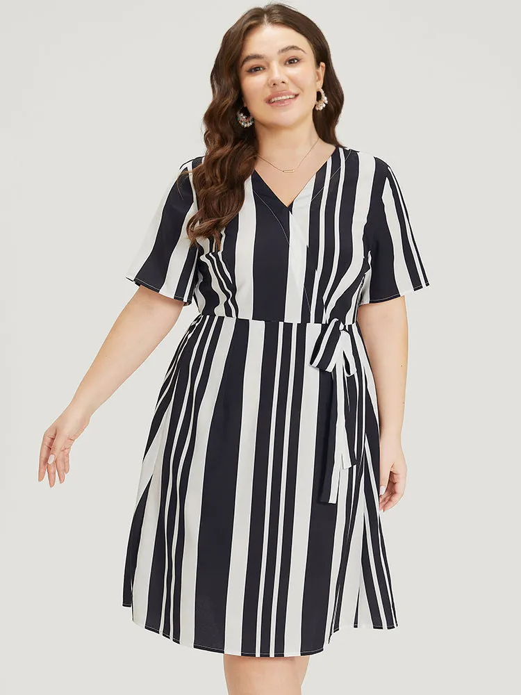 Striped Print Bowknot Pocket Surplice Neck Dress sold by Bloomchic