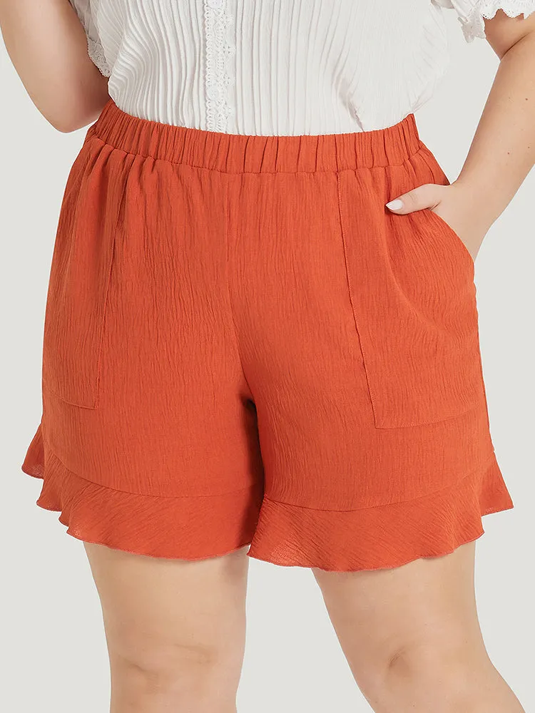 Plain Ruffle Hem Pocket Elastic Waist Shorts sold by Bloomchic