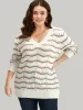 Wave Striped Cut Out V Neck Cardigan sold by Bloomchic