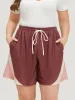 Contrast Pocket Drawstring Elastic Waist Shorts sold by Bloomchic