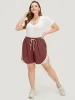 Contrast Pocket Drawstring Elastic Waist Shorts sold by Bloomchic