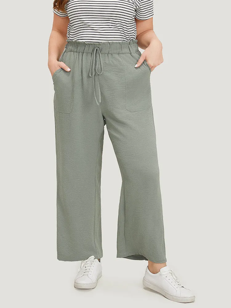 Solid Pocket Ties Paperbag Waist Pants sold by Bloomchic