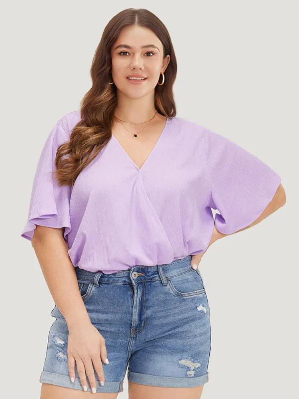 Solid Ruffle Sleeve V Neck Ruched Bodysuit sold by Bloomchic