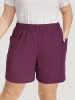 Solid Patched Pocket Elastic Waist Shorts sold by Bloomchic