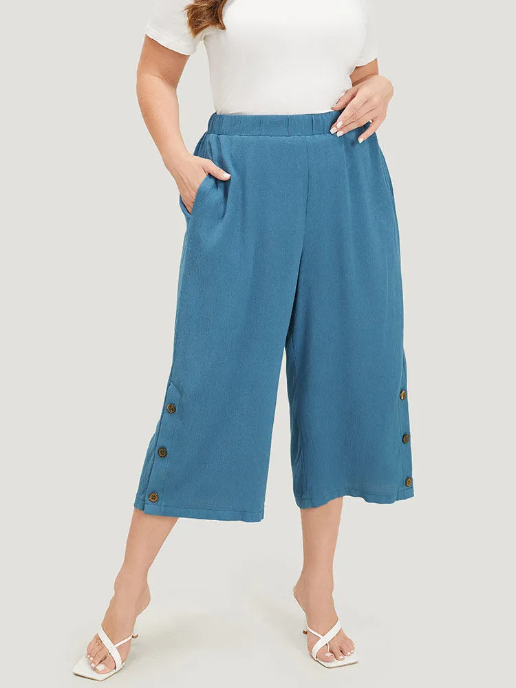 Solid Button Gathered Pocket Loose Cropped Pants sold by Bloomchic