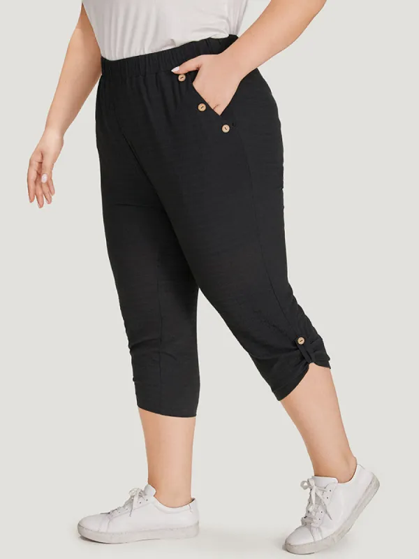 Solid Pocket Button Detail High Rise Pants sold by Bloomchic