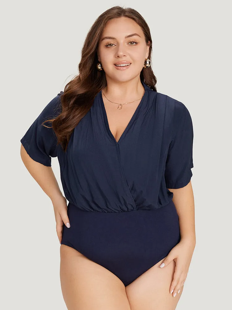 Solid Overlap Collar Pleated Bodysuit sold by Bloomchic
