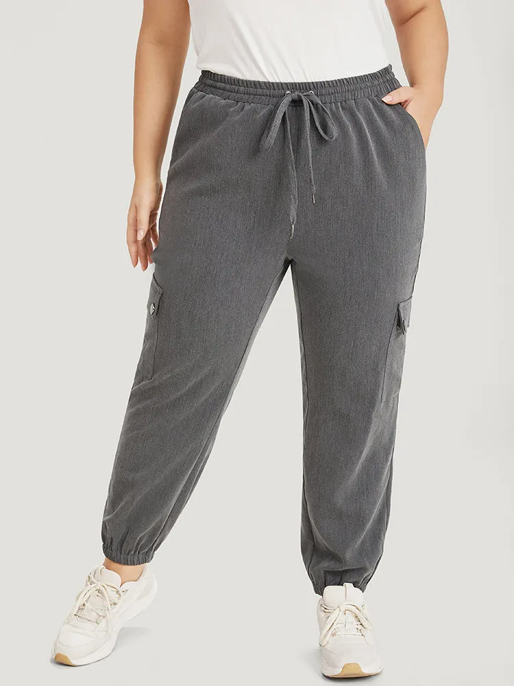 Plain Eyelet Drawstring Flap Pocket Sweatpants sold by Bloomchic