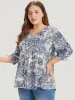 Print Knot Neck Lantern Sleeve Ruffle Hem Blouse sold by Bloomchic