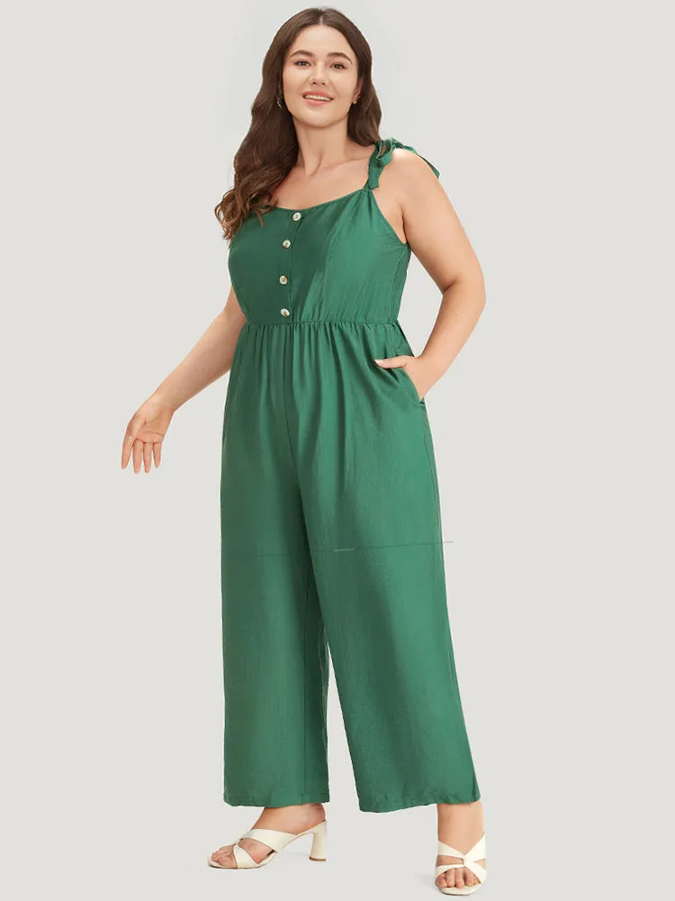 Solid Button Detail Pocket Elastic Waist Knotted Shoulder Jumpsuit sold by Bloomchic