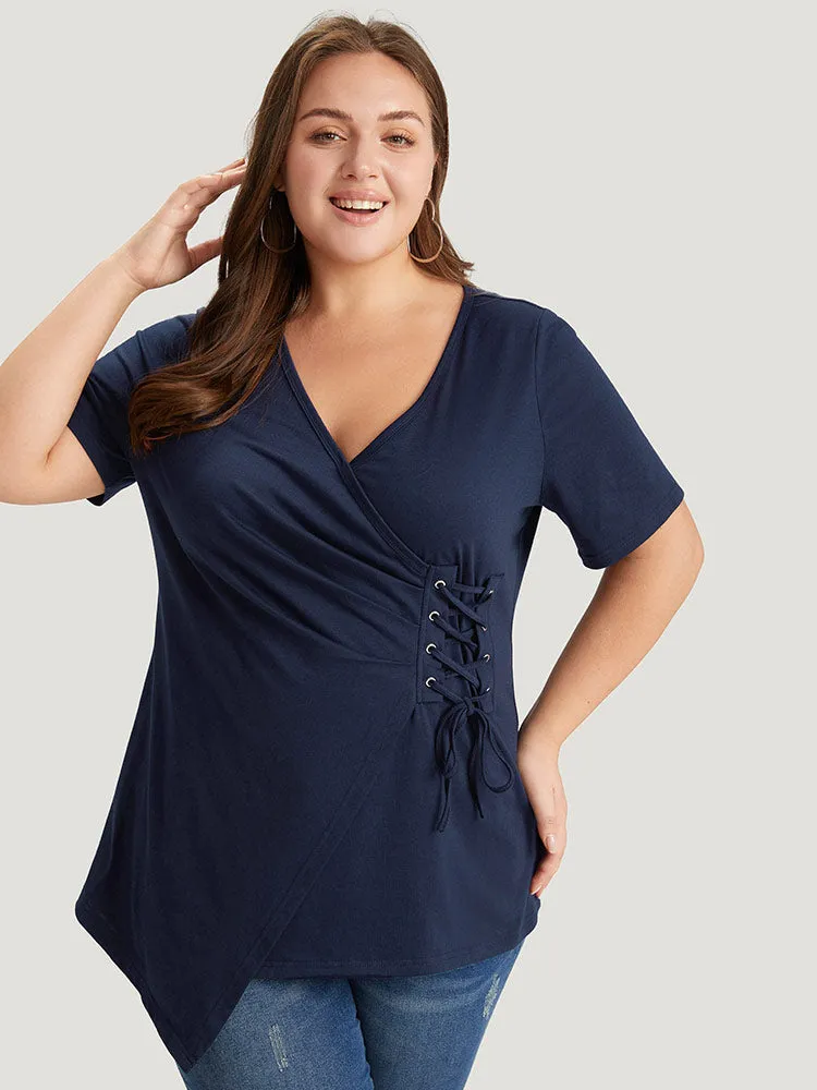 Solid Wrap Lace Up Side Asymmetrical Hem T-shirt sold by Bloomchic