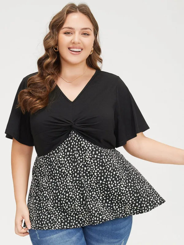 Leopard Patchwork Twist Ruffle Sleeve Blouse sold by Bloomchic