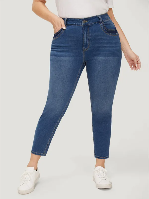 Very Stretchy High Rise Medium Wash Patched Patchwork Jeans sold by Bloomchic