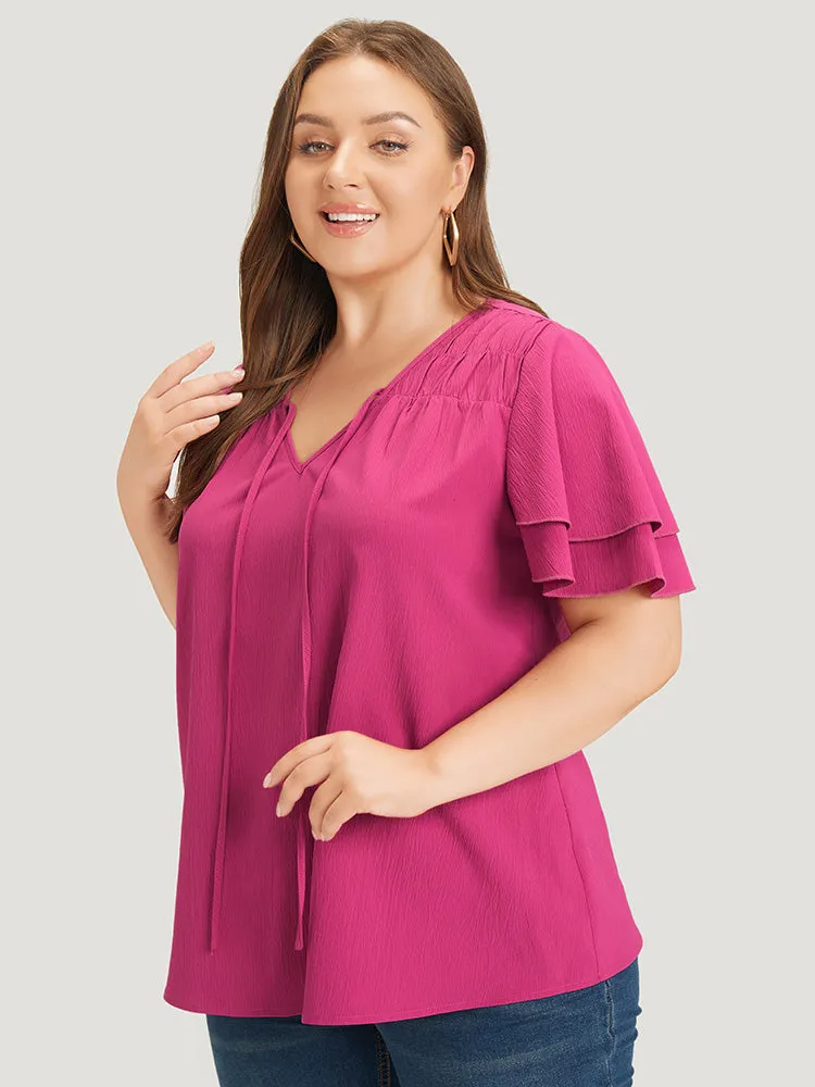 Solid Tie Neck Shirred Flutter Layered Sleeve Blouse sold by Bloomchic product image thumbnail 4