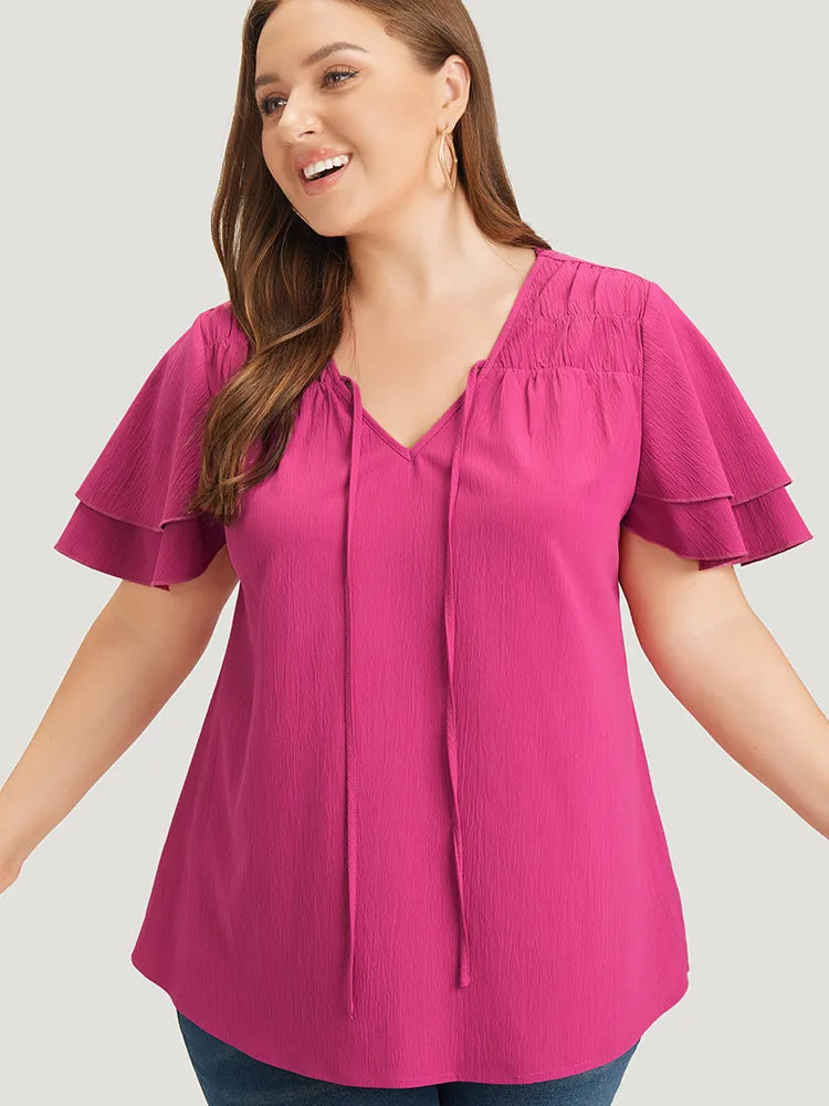 Solid Tie Neck Shirred Flutter Layered Sleeve Blouse sold by Bloomchic product image thumbnail 3