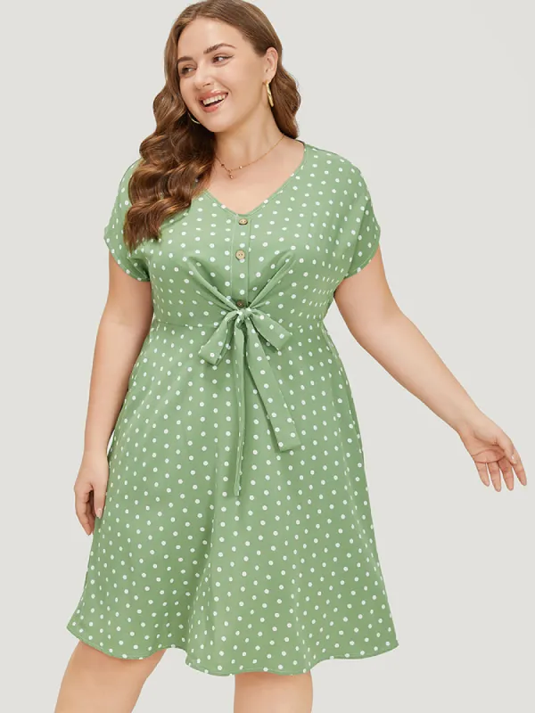 Polka Dot Pocket Button Detail Twist Front Knee Dress sold by Bloomchic