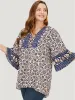 Bandana High Low Hem Bell Sleeve Blouse sold by Bloomchic