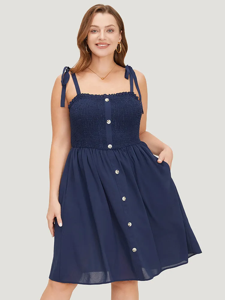 Plain Button Detail Pocket Shirred Ruffles Knot Cami Dress sold by Bloomchic