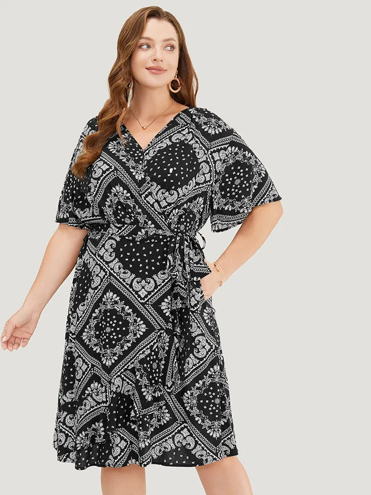 Paisley Print Pocket Belted Wrap Flutter Sleeve Dress sold by Bloomchic