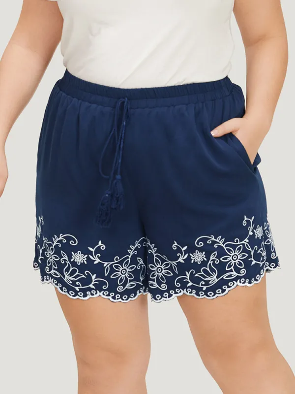 Floral Embroidered Pocket Knotted Lettuce Trim Shorts sold by Bloomchic