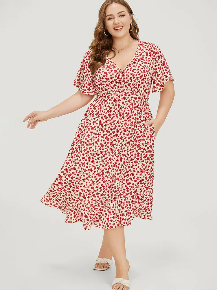 Ditsy Floral Knot Front Pocket Ruffle Hem Dress sold by Bloomchic
