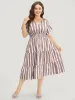Striped Contrast Pocket Shirred Flutter Tiered Dress sold by Bloomchic