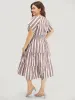 Striped Contrast Pocket Shirred Flutter Tiered Dress sold by Bloomchic