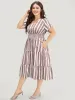 Striped Contrast Pocket Shirred Flutter Tiered Dress sold by Bloomchic