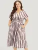 Striped Contrast Pocket Shirred Flutter Tiered Dress sold by Bloomchic