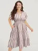 Striped Contrast Pocket Shirred Flutter Tiered Dress sold by Bloomchic