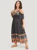 Bandana Print Pocket Ruffle Trim Cold Shoulder Maxi Dress sold by Bloomchic