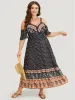 Bandana Print Pocket Ruffle Trim Cold Shoulder Maxi Dress sold by Bloomchic