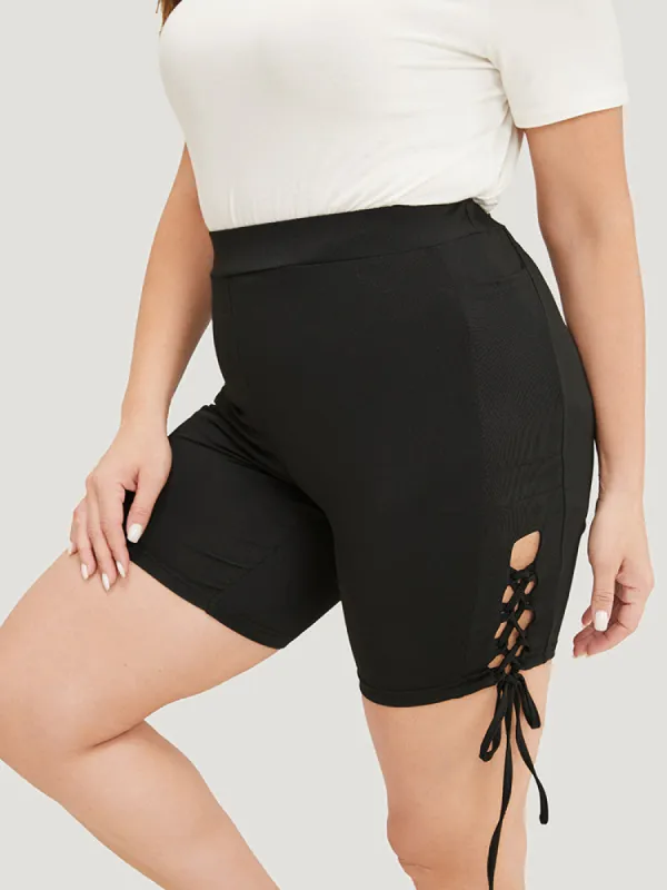 Solid Cut Out Lace Up Shorts sold by Bloomchic