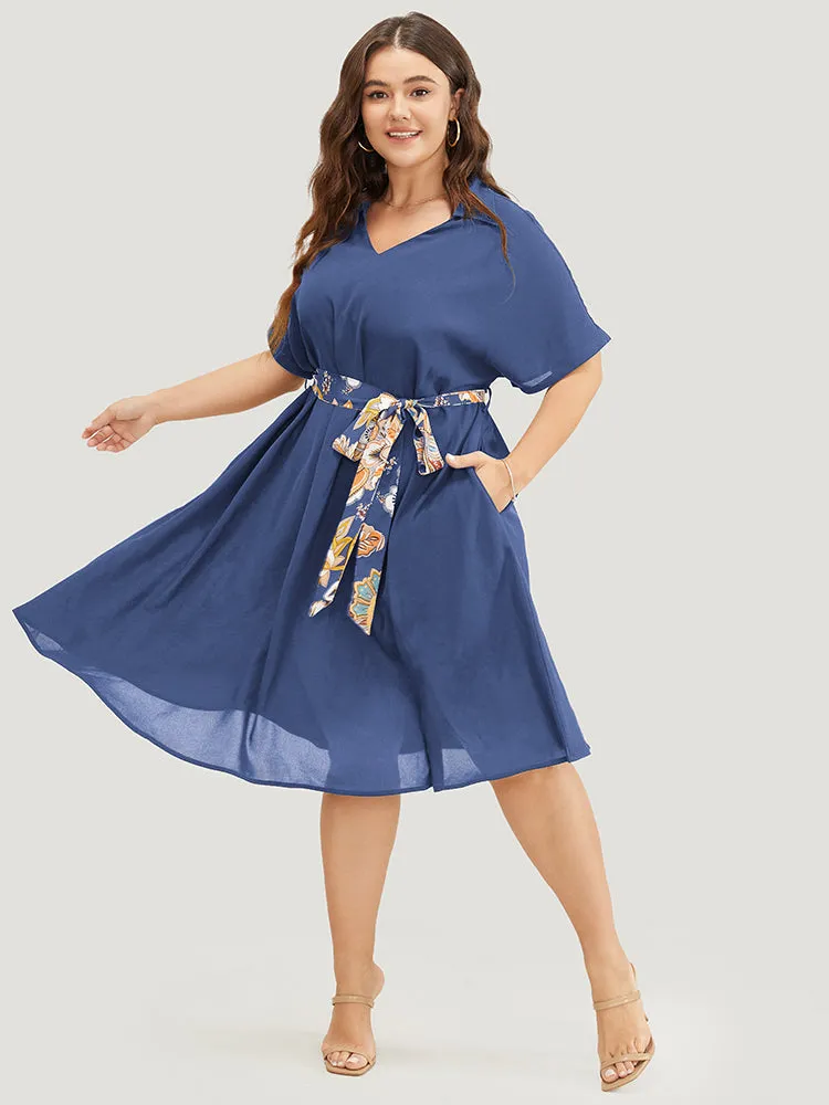 Solid Dolman Sleeve Pocket Floral Belted Flutter Dress sold by Bloomchic product image thumbnail 3