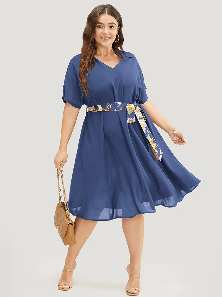 Solid Dolman Sleeve Pocket Floral Belted Flutter Dress sold by Bloomchic product image thumbnail 4