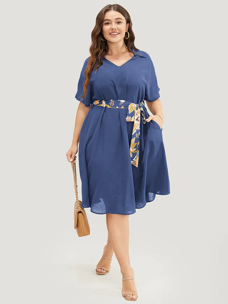 Solid Dolman Sleeve Pocket Floral Belted Flutter Dress sold by Bloomchic