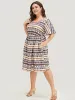 Bandana Print Pocket Ruffle Keyhole Knee Dress sold by Bloomchic
